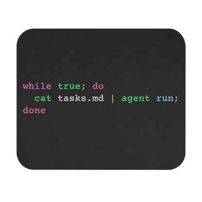 dark-mode mousepad with a bash loop piping tasks into an agent run - for desks stuck in productive infinity.