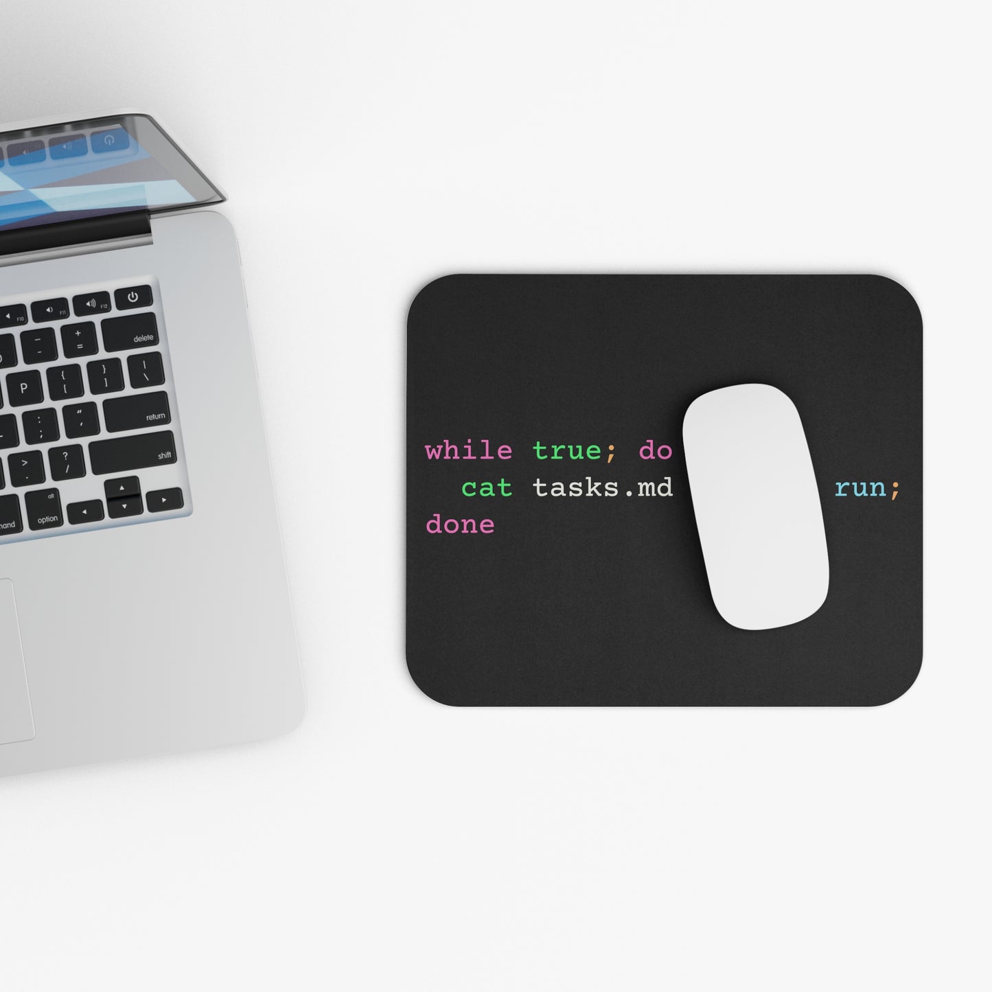 dark-mode mousepad with a bash loop piping tasks into an agent run - for desks stuck in productive infinity.